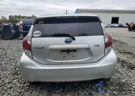 2015 Toyota Prius C from USA, damaged, VIN JTDKDTB3XF1104357